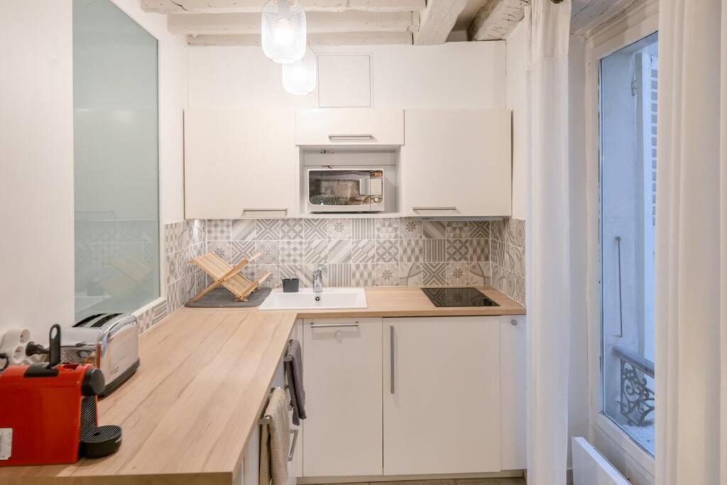 Cosy Appartement En Plein Marais Париж Экстерьер фото